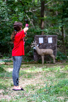 Young Girl Practicing Deer Hunting Skills