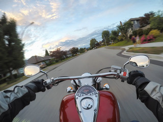 Riding a motorcycle during a vibrant sunset. Taken in Surrey, Greater Vancouver, British Columbia, Canada.