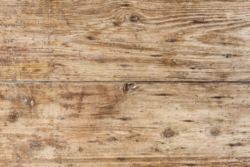 Fototapeta premium The old brown texture painted wooden boards.
