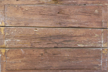 Fototapeta premium The old brown texture painted wooden boards.
