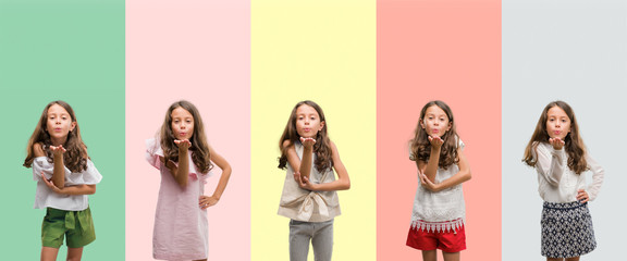 Collage of brunette hispanic girl wearing different outfits looking at the camera blowing a kiss with hand on air being lovely and sexy. Love expression.