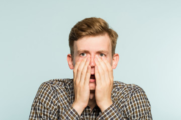 omg unbelievable shock amazement. dumbfounded man with open mouth. portrait of a young guy on light background. emotion facial expression and reaction concept. - obrazy, fototapety, plakaty