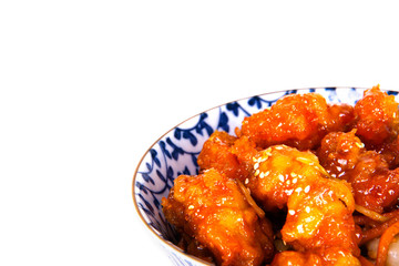 A close up of a bowl of Chinese Food, Orange Chicken and chow mein