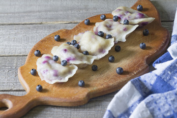 Vareniki (pierogi, dumplings) with blueberries