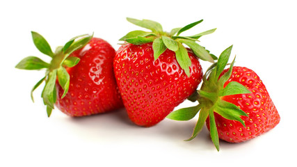 Three ripe strawberries isolated on white background.
