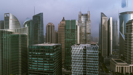 Obraz na płótnie Canvas aerial view of Shanghai Landmark Building in fog