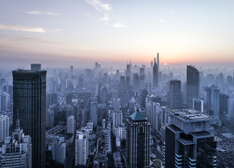 aerial view of shanghai city in foggy dawn