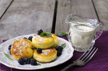 Cheese pancakes with berries. Russian Cheesecakes