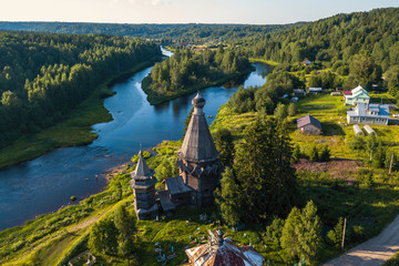 Top view of Vazhinka river and Church of St. Nicholas (built 1696) in Soginicy village, Leningrad...