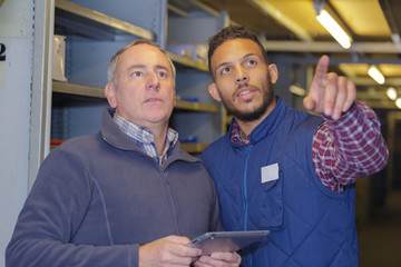 two workers solving a problel