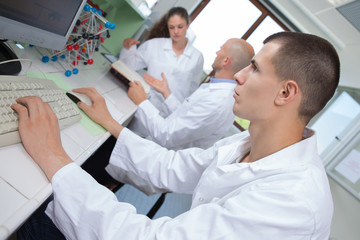 a young male scientists do cultivating scientific research experiment