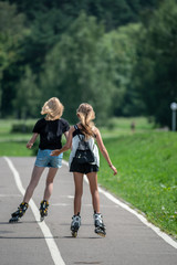 girl roller skate in park