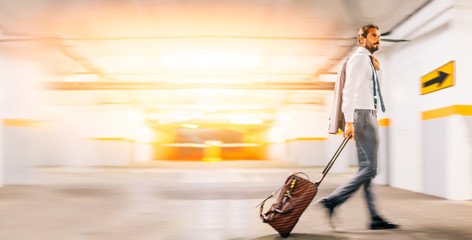 Long Exposure Traveler In Motion Blured Background Modern Businessman Walking Concept