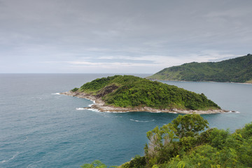 Phuket, Thailand. Promthep Cape early in the morning. View of the coast and the island in the Andaman sea