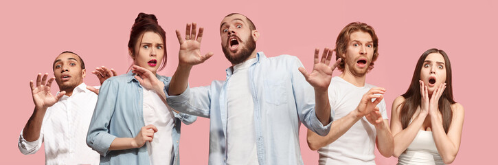 Group of frightened people, woman and man stressful keeping hands on head, terrified in panic, shouting