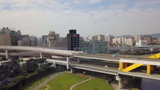 taipei city sunny day traffic river bridge park aerial panorama 4k taiwan
