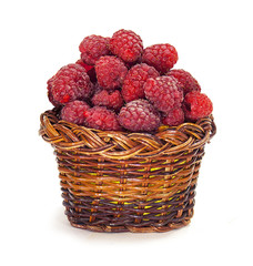 Fototapeta na wymiar Fresh Raspberry in a basket over white background