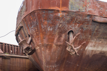 Close up  two old rusty anchors on broken abandoned rusty ship