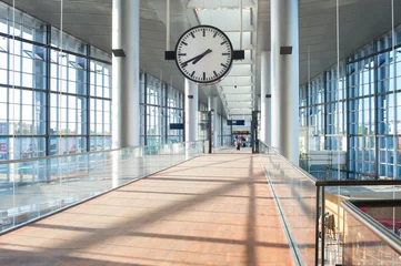 Printed roller blinds Airport Clock at modern airport hall