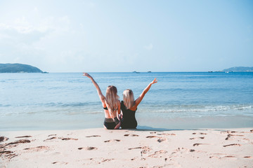 Two blondy girls on the beach