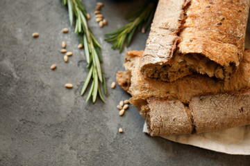 Fresh tasty bread on table, closeup