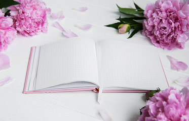 note book with peonies