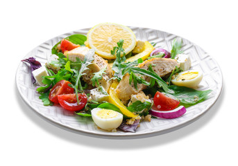 Plate with delicious chicken salad on white background