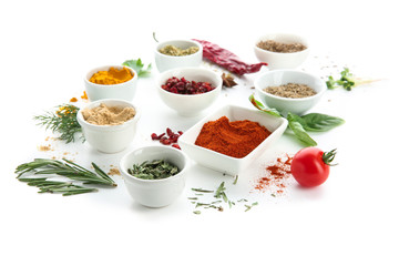 Composition with different spices on white background