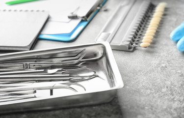 Tray with dentist's tools on light table