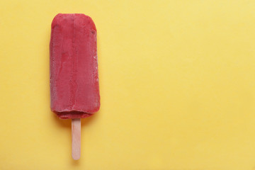 Tasty strawberry ice-cream on color background