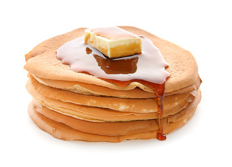 Delicious pancakes with honey and butter on white background
