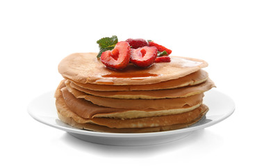 Plate with delicious pancakes, honey and strawberries on white background