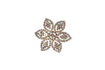 golden brooch with stones on white isolated background