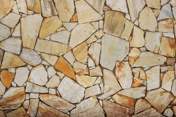 Stone wall. Fragments of masonry. Natural background.