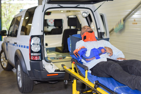 Ambulance And Patient On A Gurney Outside