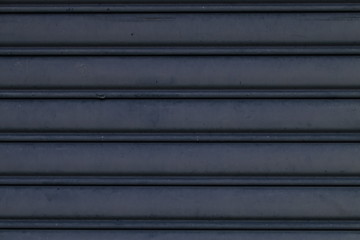 Obraz premium Roller shutter doors - grey background - close up