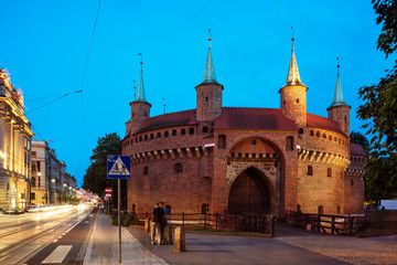 Barbican at night in the old town of Krakow, Poland.