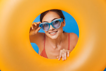 Portrait of a smiling young girl in swimsuit