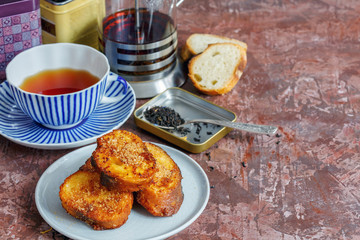 French toast and a cup of breakfast tea.