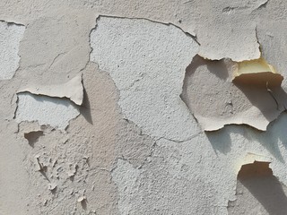 Texture of a stone wall. Old wall background. Stone wall as a background or texture. Corrosion on a stone wall.
