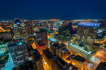 Fototapeta na wymiar View of Downtown at night, in Baltimore, Maryland