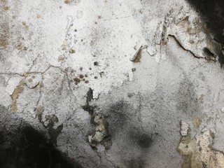 Texture of a stone wall. Old wall background. Stone wall as a background or texture. Corrosion on a stone wall.