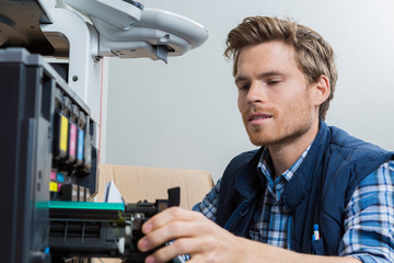 Man working on photocopying