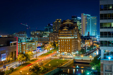 Fototapeta na wymiar View of Harbor East at night, in Baltimore, Maryland