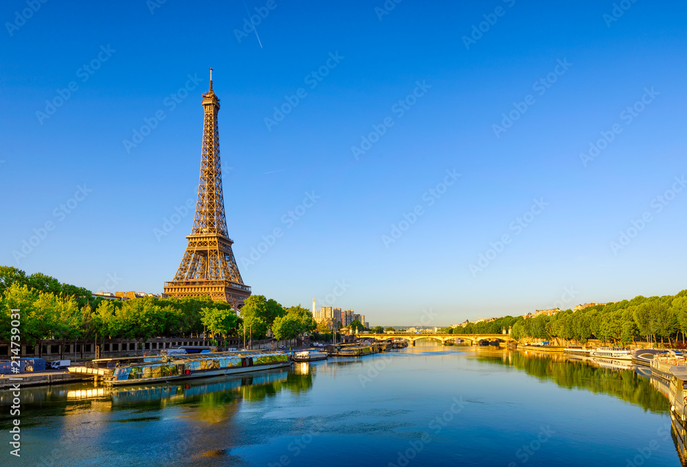 Canvas Prints view of eiffel tower and river seine at sunrise in paris, france. eiffel tower is one of the most ic