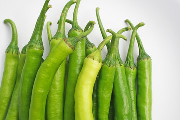 Fresh big green chilli isolated on white background