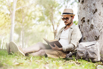 Fototapeta premium Reading a book at park
