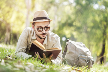 Reading a book at park