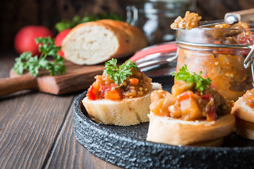 Bread toasts with eggplant caviar.