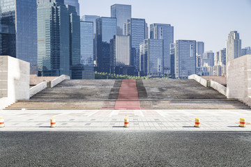 Panoramic skyline and modern business office buildings with empty road,empty concrete square floor